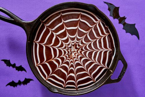 Spooky Fudgy Cobweb Cake: