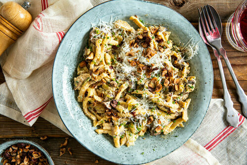 Spätzle in romige champignonsaus
