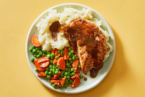 Pan Roasted Chicken Mashed Potatoes With Herb Gravy Peas Carrots Dinnerly