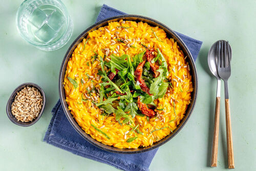 Vegan pompoenrisoni "mac 'n cheese"-stijl