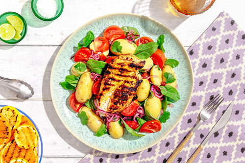 Vrolijke aardappelsalade met extra veel kip