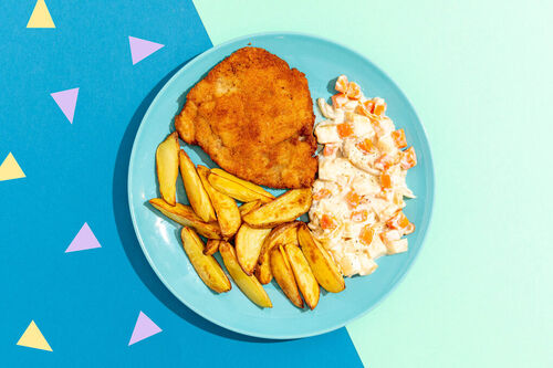 Schnitzel met aardappels uit de oven