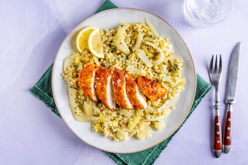 Knapperig gepaneerde biologische kipschnitzel