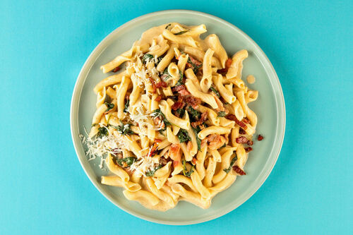 Penne met spek en spinazie