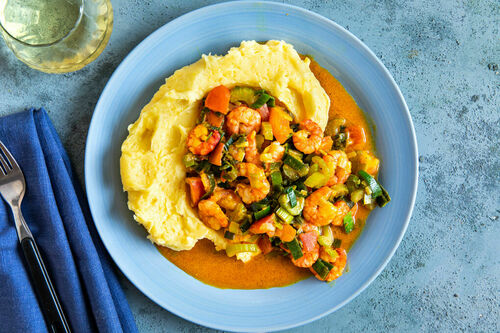 Cajungarnalen in tomaten-preisaus