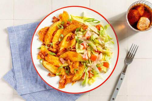 Aardappelwedges met spek en kaas